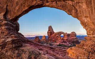 Rock Through A Window